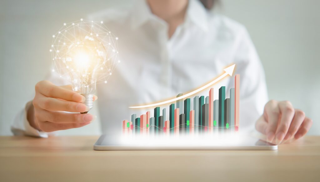 businesswoman holding light bulb with innovative